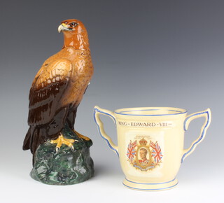A Royal Doulton Edward VIII commemorative 2 handled cup 13cm together with a Royal Doulton Golden Eagle decanter and stopper 27cm 