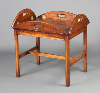 A Georgian style mahogany drop flap butler's table raised on square tapered supports with H framed stretcher 62cm h x 64cm w x 51cm d 