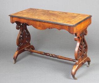 A Victorian inlaid figured walnut centre table, raised on pierced standard end supports with H framed stretcher 74cm h x 105cm w x 50cm d 