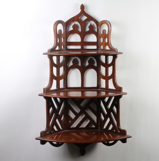 A Georgian style pierced mahogany 3 tier hanging corner shelf 89cm h x 57cm w x 23cm d 