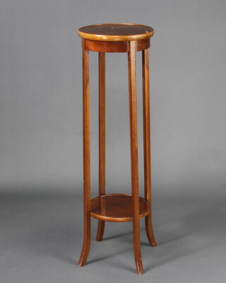 An Edwardian circular inlaid mahogany 2 tier jardiniere stand raised on outswept supports 98cm h x 30cm diam. 