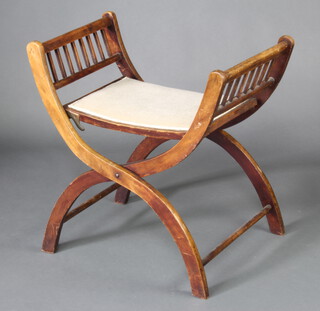 An Edwardian beech framed X framed folding stool 60cm h x 48cm w x 41cm d 