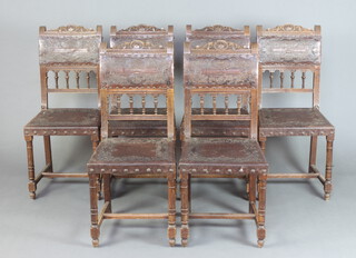 A set of 6 19th Century Carolean style carved oak and leather dining chairs, the seats and backs upholstered in embossed leather, raised on turned and fluted supports 