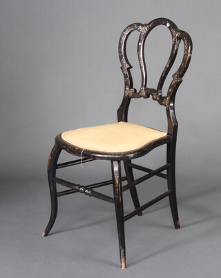 A Victorian inlaid papier mache bedroom chair with tulip shaped back and upholstered seat, raised on cabriole supports 