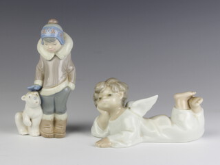 A Lladro figure of a reclining angel 13cm, ditto of a child with polar bear cub 14cm 