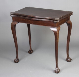 A Georgian style card table of serpentine outline raised on cabriole ball and claw supports 76cm h x 76cm w x 43cm d