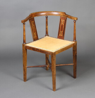 A beech framed Edwardian inlaid mahogany corner chair raised on square tapered supports with X frame stretcher