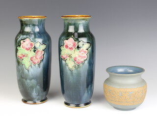 A pair of Royal Doulton oviform vases decorated with flowers 26cm and a Doulton Silicon ware baluster vase 11cm 