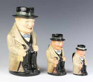 A Royal Doulton character jug Winston Churchill Prime Minister of Great Britain 1940 23cm, a ditto 13cm and 1 other 10cm 