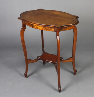An Edwardian shaped oval 2 tier occasional table raised on cabriole supports 73cm h x 66cm w x 44cm d  