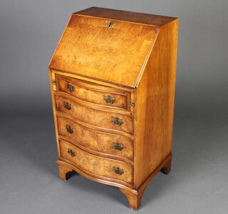 A Queen Anne style figured walnut and crossbanded bureau with fall front above a bow front base fitted 4 long graduated drawers with brass swan neck drop handles, raised on bracket feet 95cm h x 53cm w x 42cm d 