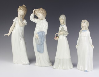 A Nao figure of a young boy in a night robe 27cm and 3 other figures