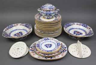 A Mintons Ironstone part dinner service comprising 3 small plates (2 chipped), 10 medium plates (1 cracked), 7 dinner plates (3 cracked), a sauce tureen and cover (finial damaged), 2 drainers, a pedestal dish (cracked), a ditto, 2 tureen stands (1 chipped), 5 side plates (1 chipped), 2 oval meat plates (1 cracked) and all have some rubbing