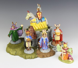 Royal Doulton Bunnykins, The Arthurian Legends Collection - Sir Lancelot DB301, Marian DB303, King Arthur DB304, Sir Gawain, Queen Gwynevere, Sir Galahad and Merlin DB303 together with the en suite base  