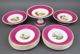 An Edwardian dessert service with burgundy rim enclosing landscape views comprising 3 tazzas and 12 plates (2 plates cracked and chipped) 