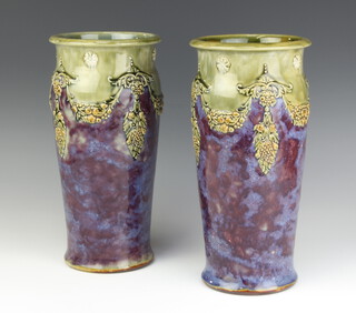A pair of Royal Doulton oviform vases decorated with fruits and leaves 30cm 