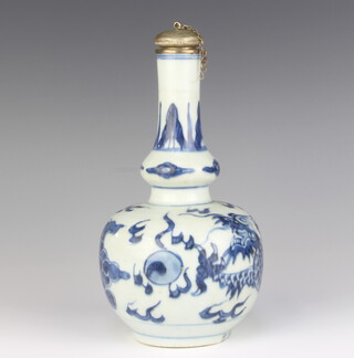 A 19th Century Chinese bottle vase decorated with a dragon chasing the flaming pearl, having a white metal lip and cover 19cm 