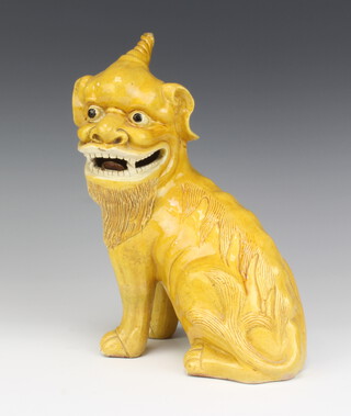 A 19th Century Chinese yellow glazed figure of a Shi Shi 28cm 