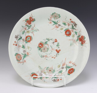 An 18th Century Chinese verte shallow dish decorated with flowers 35cm