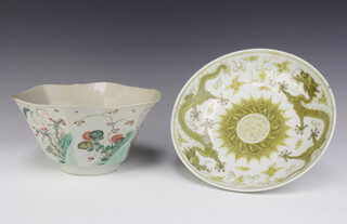 A 19th Century Chinese hexagonal bowl decorated with panels of flowers and insects 20cm, a Chinese shallow dish decorated with dragons 21cm 