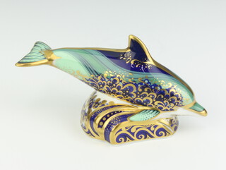 A Royal Crown Derby Imari pattern paperweight of a baby bottlenose dolphin with gold stopper 12cm 