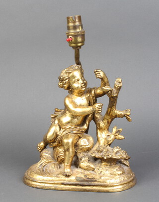 A gilt bronze figure of a seated cherub with a lizard, converted to a table lamp 20cm h x 20cm w x 11cm d 