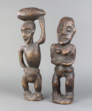 Two African carved wooden tribal figures 37cm x 8cm 
