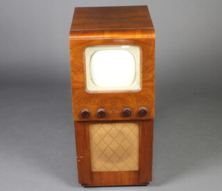 A Phillips Model M1024 television with 20cm screen 