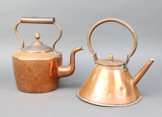 A Victorian circular waisted copper kettle with acorn finial and swing handle 27cm x 21cm, together with a Victorian circular copper kettle with acorn finial 26cm x 13cm 