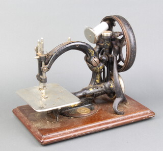 A Wilcox and Gibbs sewing machine 
