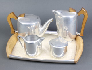 A Picquot ware 5 piece tea service comprising twin handled tea tray, hot water jug, cream jug, teapot and sugar bowl 