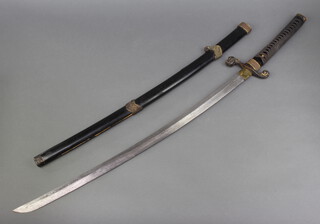 A Japanese Katana sword, the tang with 4 figure signature and 69cm blade, contained in a lacquered scabbard 