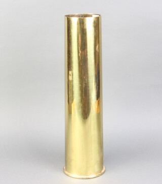 A brass shell case 49cm x 11cm 