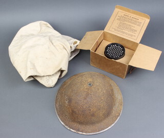 A British steel helmet (no liner), a World War Two Civilian gas mask and box together with a canvas kit bag 