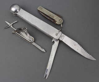 A Redington folding fishing knife with file and clip, a Continental twin bladed fishing knife incorporating priest and tape measure and a Guide folding knife with spike 
