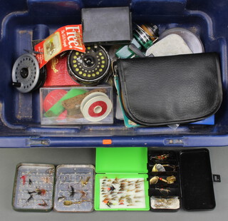 Two unmarked 9cm centre pin fishing reels, 2 others, a Wheatley metal fly box, "The Touch" fly box, 3 plastic fly boxes, etc 