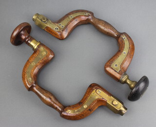 Two 19th Century unmarked mahogany and brass braces 