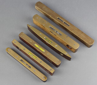 Two J R Bone and Sons brass and mahogany spirit levels, a Wilson Lovatt and Sons mahogany and brass spirit level, a Marples and Sons ditto spirit level marked GTL and 1 other 