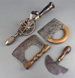 A Millers Falls Mass no.2 steel and mahogany hand drill, a crescent shaped vegetable chopper marked J Tyzack and Sons 1915 and 2 other vegetable chopper