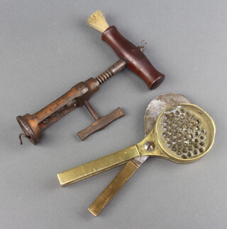 A 19th Century metal ratchet corkscrew and a curious brass cutter 