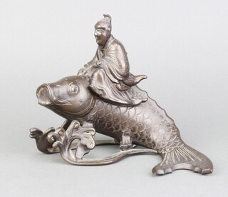 A Japanese bronze trinket box in the form of a carp being ridden by a seated gentleman 14cm x 19cm x 11cm 