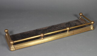 A Victorian brass railed fire curb 19cm h x 120cm w x 36cm d 