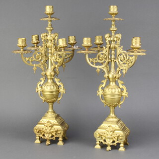 A pair of gilt metal 5 light candelabrum raised on cup and cover support with shaped base 47cm h x 20cm w x 20cm d 