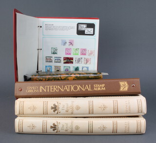 A Stanley Gibbons International stamp album of world stamps - South Africa, Singapore, Russian, Poland, Netherlands, a Stanley Gibbons Worldex album of stamps - India, Hong Kong, Germany, Finland, 2 ditto Royal Wedding of HRH Prince Charles and Lady Diana Spencer stamp albums of mint commonwealth stamps and a stock of GB stamps 