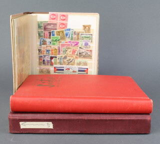 A Swiftsure stamp album of GB and Commonwealth stamps Victoria and later - Canada, India, etc, a stock book of word stamps - African States, Brazil, Chile, USA and 1 other 