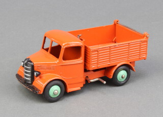 Dinky, a rare Bedford End Tipper Truck (25m) all orange with light green hubs 