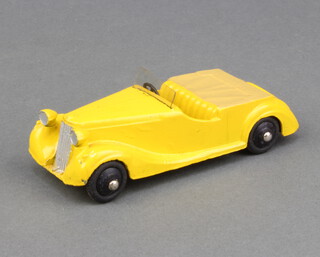 Dinky, a 1947/49 Sunbeam Tablot Sports car in yellow with fawn tonneau and black hubs