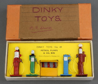 Dinky a Petrol Pumps set and oil bin ( No .49 ) boxed with yellow hoses