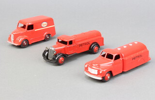 Dinky, a 1948-50 Petrol Tanker (25d) in red with black lettering "PETROL" and moulded chassis, a Petrol Tanker (30p)  in red with black lettering "PETROL" and an 'Esso' Trojan Van (450)
