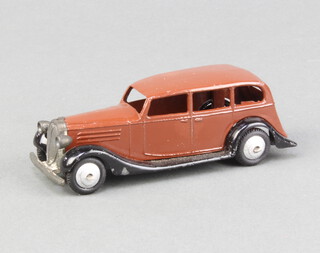 Dinky, an uncommon 1946-47 Vauxhall (30d) in black and brown with silver ridged hubs
